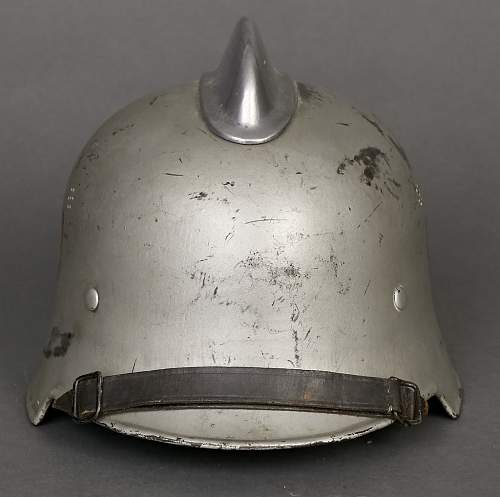 GERMAN MODEL 1934 FIRE POLICE CIVIC  HELMET,  Silver painted.