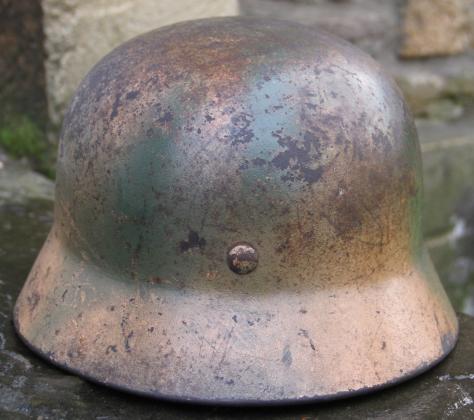 Ex DAK? Cammo M35 helmet.