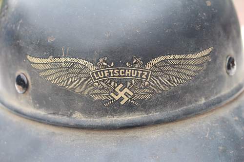 Luftschutz helmet with decal.