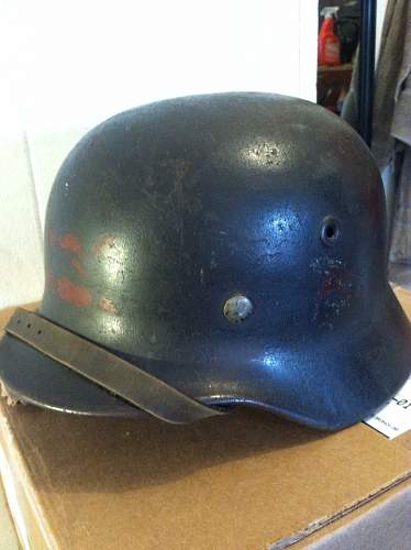 M40 quist helmet with red marking on front