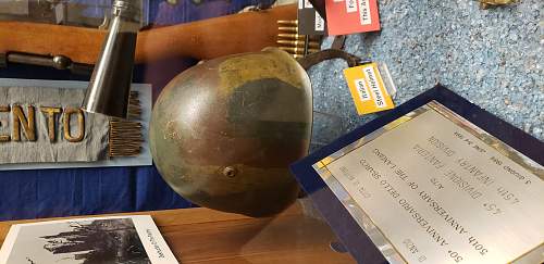 U.S. CAPTURED M40, 45th Infantry Division swastika helmet and museum displays.