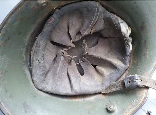 Need help authenticating this M16 German helmet and the worth of it.