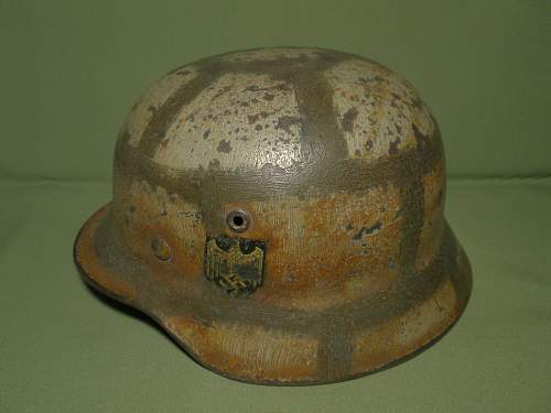 unusual camo german helmet  what do you think?