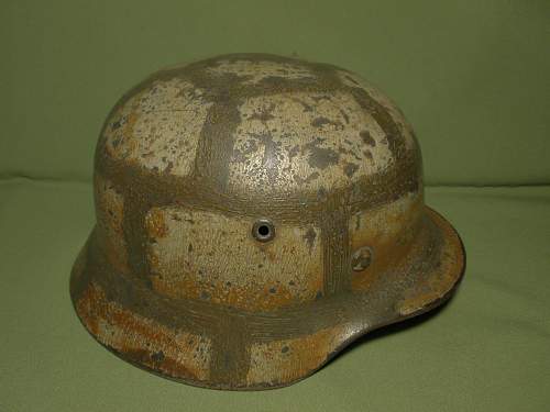 unusual camo german helmet  what do you think?