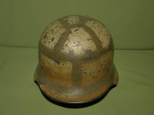 unusual camo german helmet  what do you think?