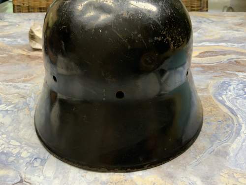 Postwar Reused Tranistional SA type Helmet?