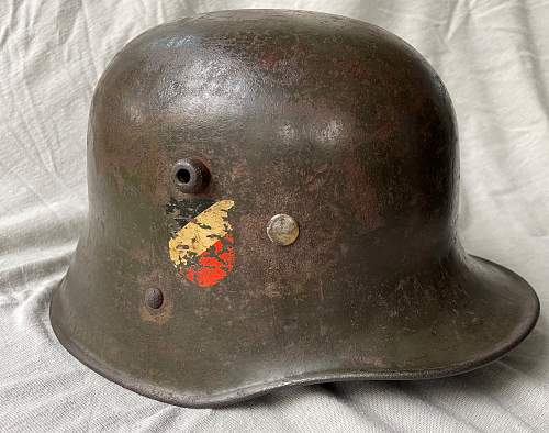 Re-issued K.u.k. helmets by the Wehrmacht with weird production error.