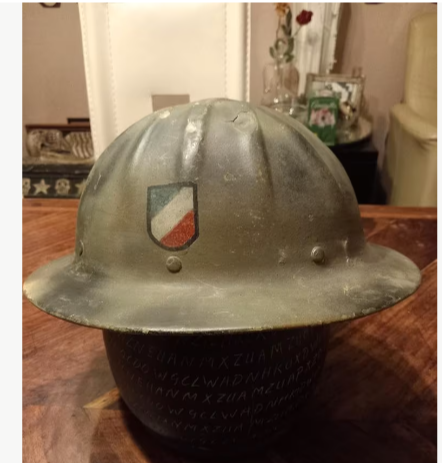 Strange helmet with fake (?) luftwaffe decal