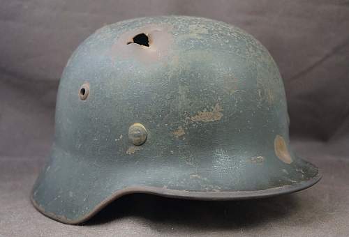 M35 Heer reissue battle damaged