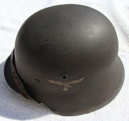 M42 Luftwaffe helmet. Anyone seen a helmet patina like this?