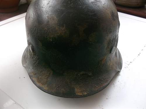 3 German helmets