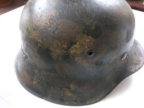 3 German helmets