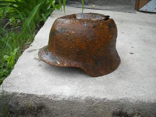 Battledamaged M35 helmet  from Kurland pocket