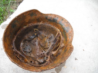 Battledamaged M35 helmet  from Kurland pocket