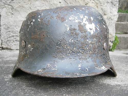 Battledamaged M35 helmet  from Kurland pocket