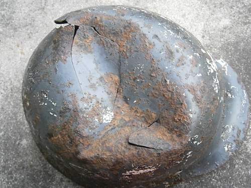 Battledamaged M35 helmet  from Kurland pocket