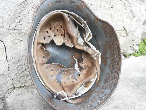 Battledamaged M35 helmet  from Kurland pocket