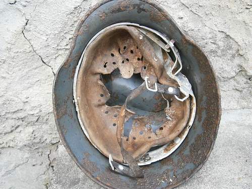 Battledamaged M35 helmet  from Kurland pocket