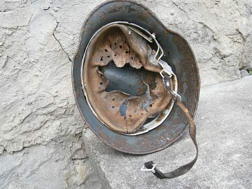 Battledamaged M35 helmet  from Kurland pocket