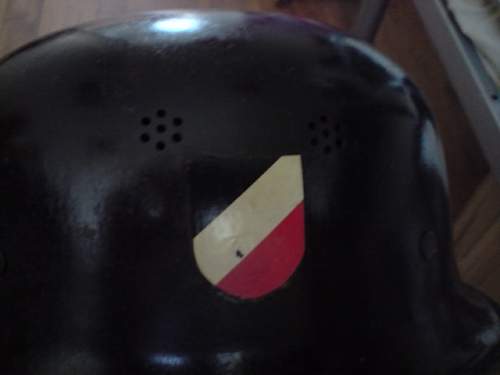 this a reissued firemans helmet??