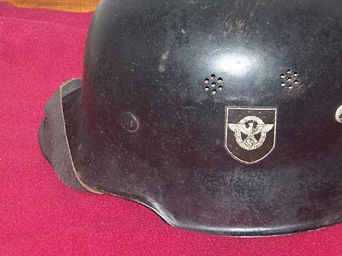 Late war M34 DD police helmet.
