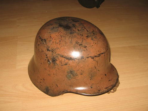 Is this a real WWII helmet, with red cross?