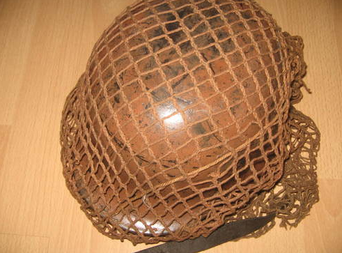 Is this a real WWII helmet, with red cross?