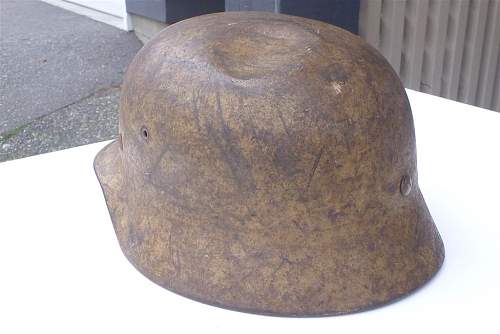 A (dirty) tan camo helmet