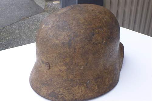 A (dirty) tan camo helmet