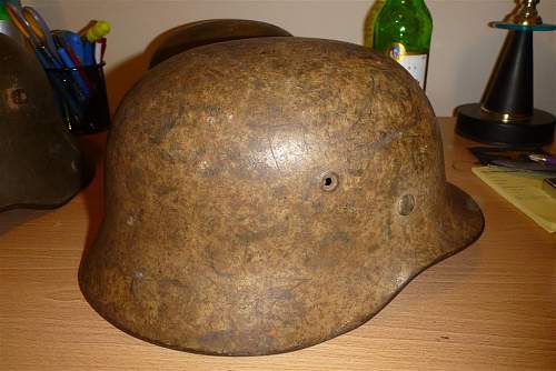 A (dirty) tan camo helmet