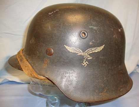 militaria fair helmet. real or fake? I cant decide...