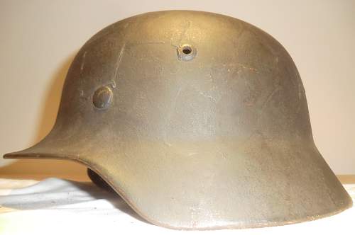 German helmet with overpaint.