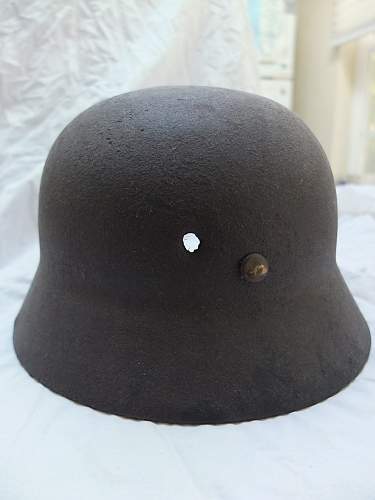 Ever seen a Nazi Helmet w/ bullet hole?