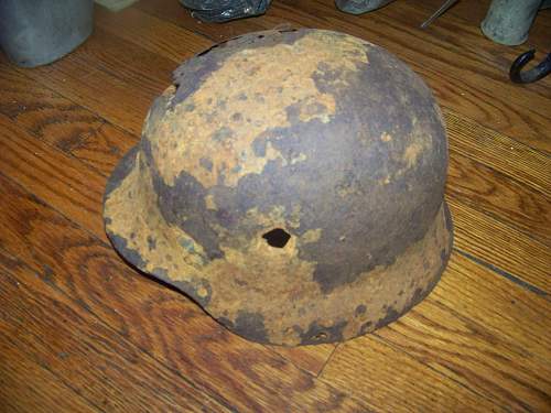 Ever seen a Nazi Helmet w/ bullet hole?