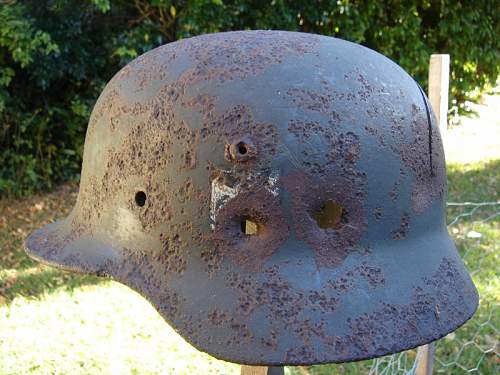 Ever seen a Nazi Helmet w/ bullet hole?