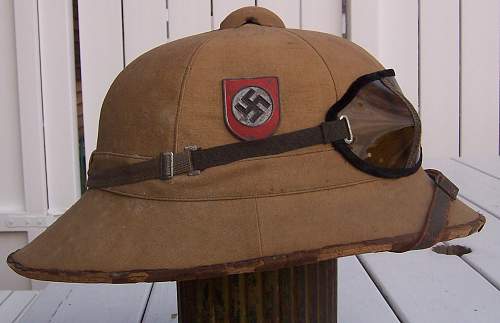 The Sun and German Helmets