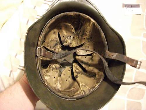 German M40 Helmet , i fear the worst :(.