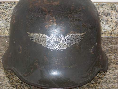 Dark green M34 luftschutz helmet.