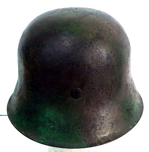 Is this helmet really an authentic post war painted Normandy camo scheme helmet?