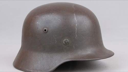 Advice on the authenticity of a M1935 Heer German Helmet for sale online.