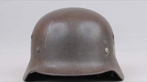 Advice on the authenticity of a M1935 Heer German Helmet for sale online.
