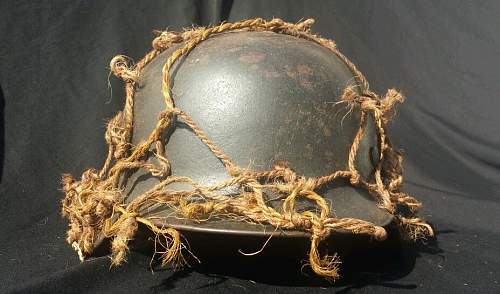 German helmet with camo netting..whats your thoughts
