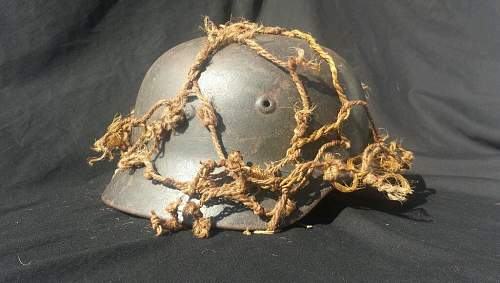 German helmet with camo netting..whats your thoughts