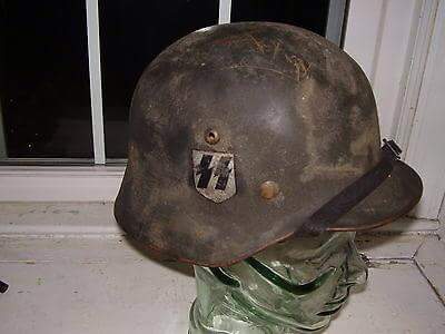 need help on this post war quist m40 helmet