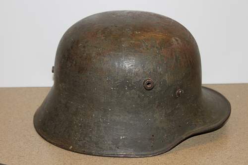 Can someone help me identify the model of this German Helmet?