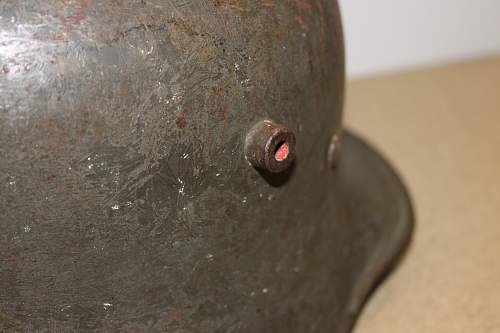 Can someone help me identify the model of this German Helmet?