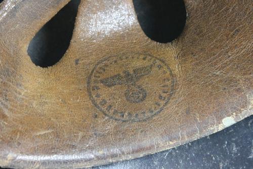 Thoughts on this liner stamp that's on a luftschutz helmet