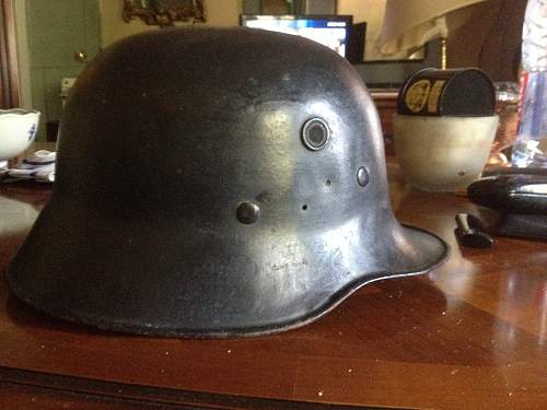 My first  early fire man helmet .