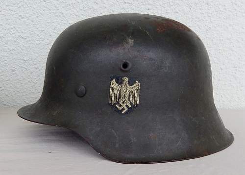 Three german helmets