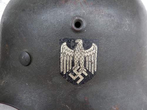 Three german helmets